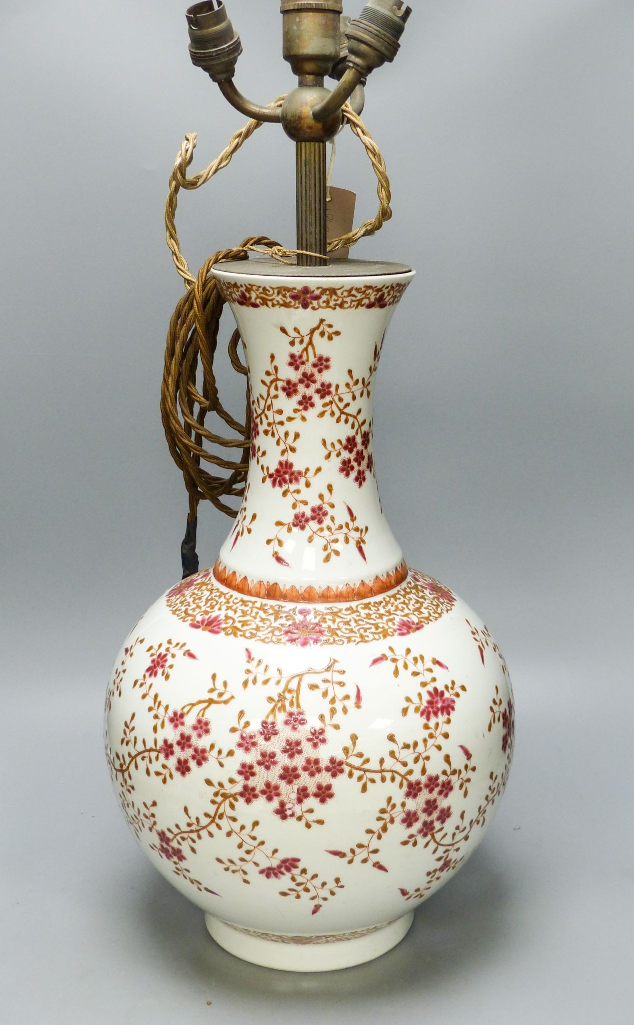 A Chinese famille rose ‘prunus’ vase, four character Qianlong mark in iron red but probably Guangxu period, height overall 83cm